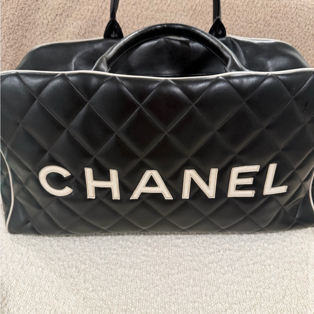 CHANEL Black Quilted Leather Tote with White Logo